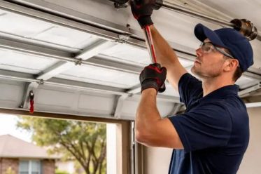 garage-door-spring-repair-technician.jpg